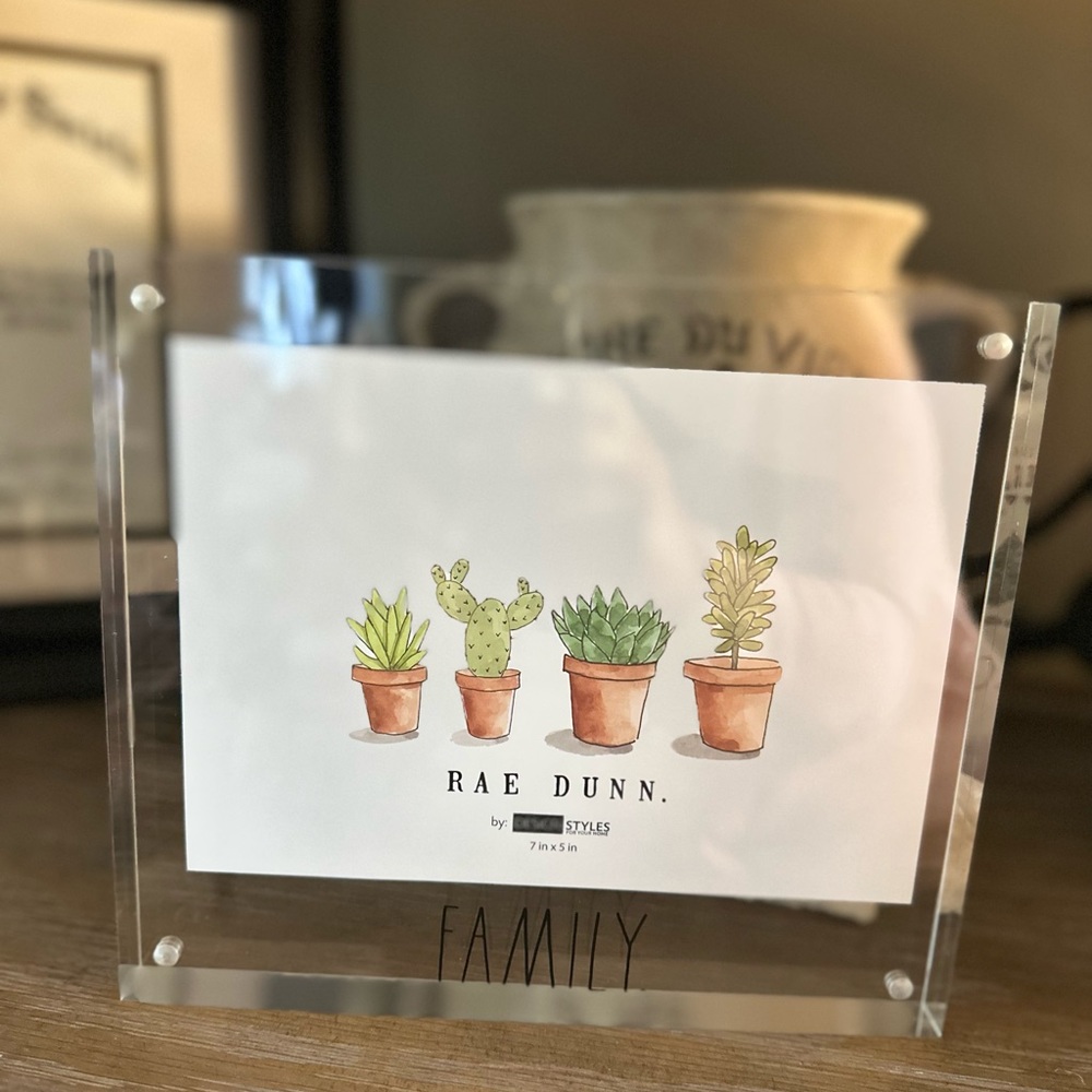 Rae Dunn acrylic picture frame with black LL FAMILY with magnetized opening.
